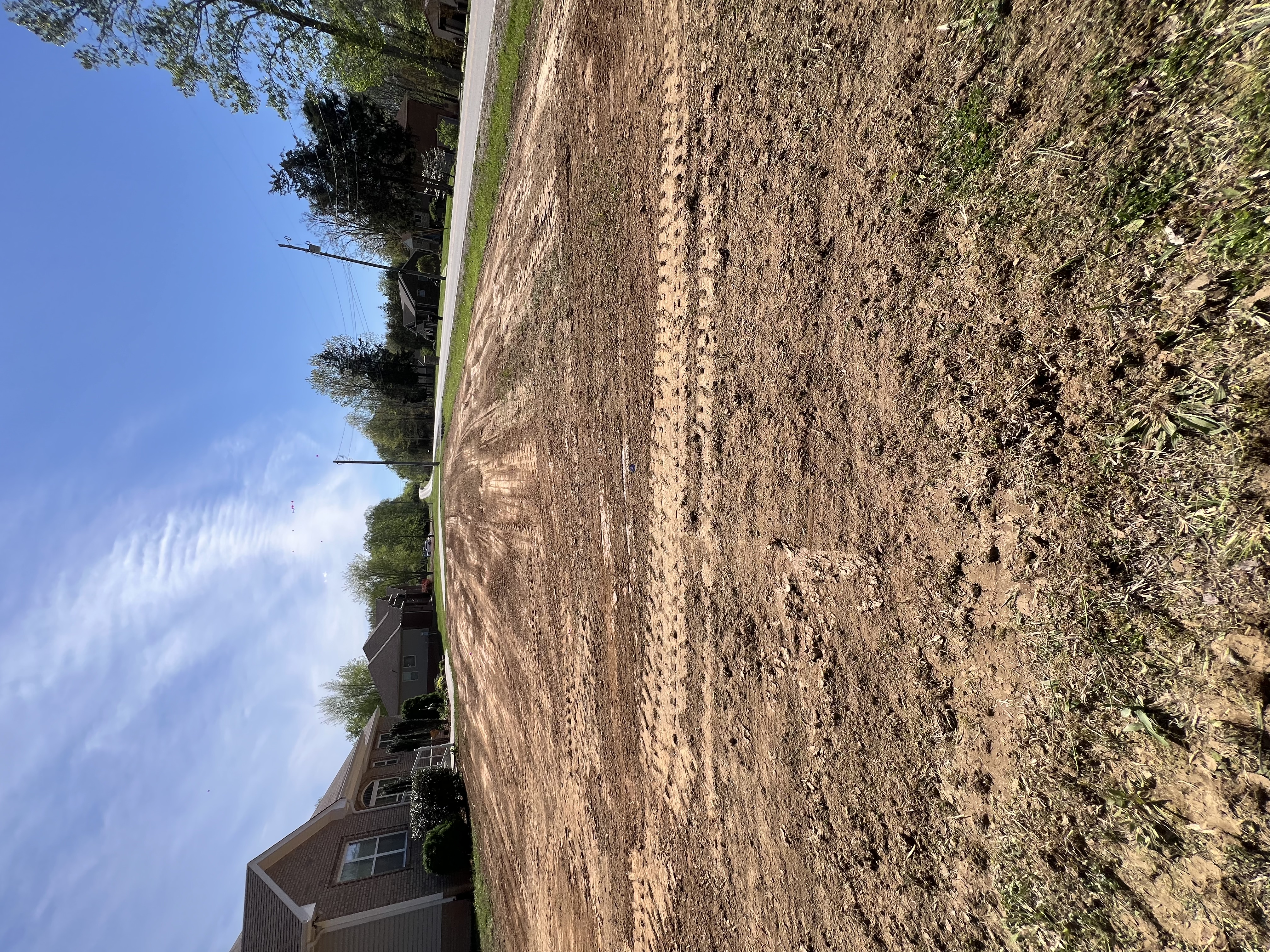 Residential land clearing project with heavy equipment